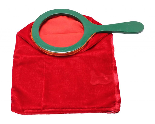 photo of a red velvet back with a zipper at the bottom and a green wooden handle on top